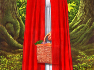 Red Riding Hood. Woman wearing a red cloak in a forest setting. She is holding a basket of food.